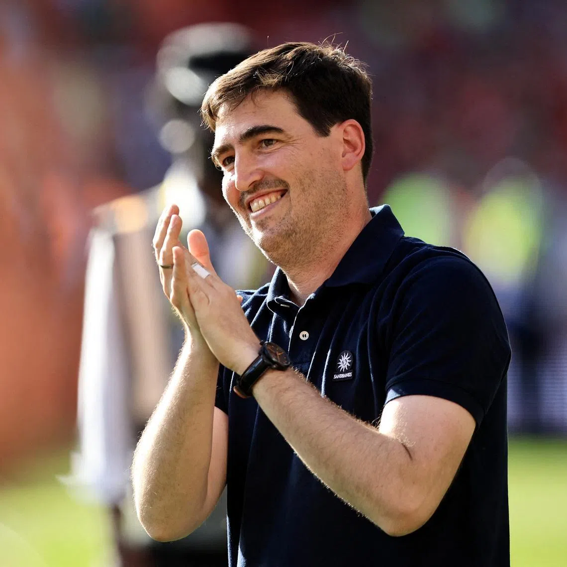 Andoni Iraola applauds Bournemouth fans after his last match for the club in May.
