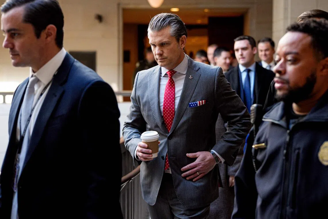 US Secretary of Defence Pete Hegseth walking from the Senate to the House on Dec 16, as he attends closed door meetings with lawmakers on Capitol Hill.