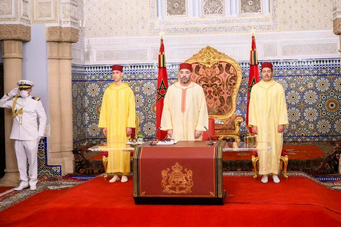 Moroccan King Mohammed VI (centre) has confirmed the 1,055-kilometre (660 miles) expressway between Tiznit and the Western Sahara city of Dakhla will be called the Donald J. Trump Highwa