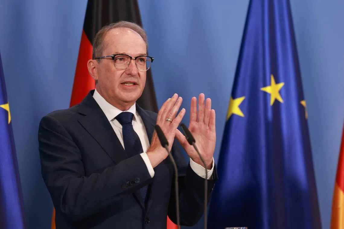 German Interior Minister Alexander Dobrindt attending a press conference following the weekly cabinet meeting on the reform of intelligence agency legislation, in Berlin on Aug 12.