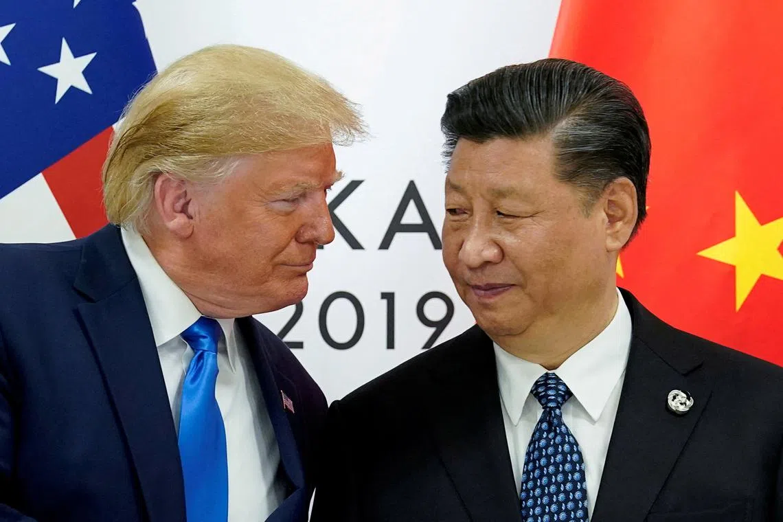 FILE PHOTO: U.S. President Donald Trump meets with China's President Xi Jinping at the start of their bilateral meeting at the G20 leaders summit in Osaka, Japan, June 29, 2019. REUTERS/Kevin Lamarque//File Photo