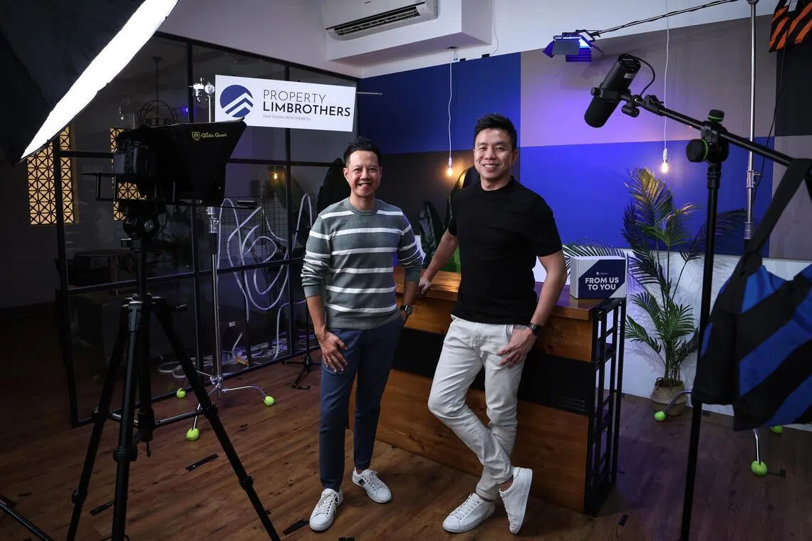Mr Adrian Lim (left) with fellow PropertyLimBrothers co-founder Melvin Lim in 2022. The latter resigned from the firm on Jan 25. 
