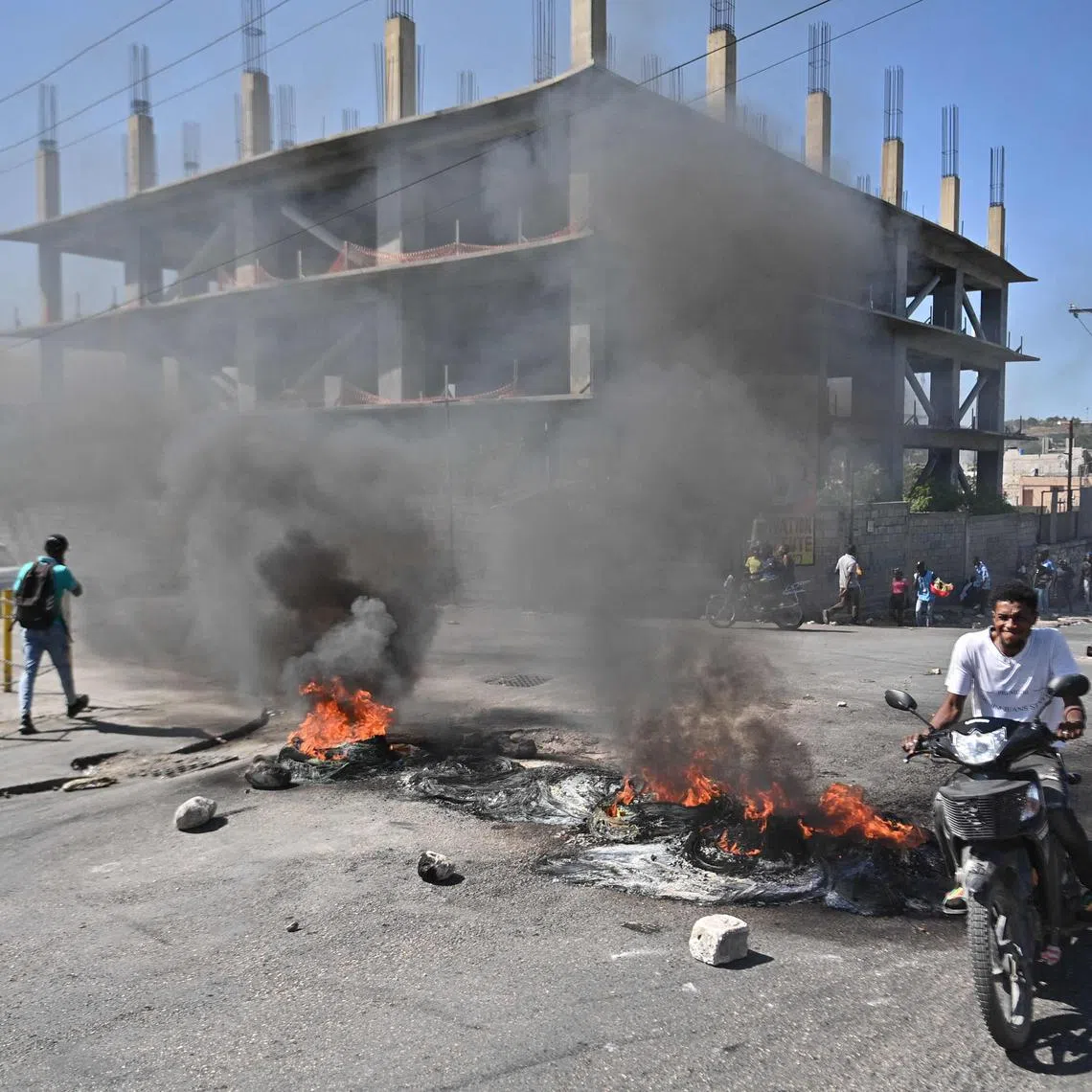 Streets were blocked off by burning tyres and rocks, sending up huge plumes of black smoke in the sky across various parts of the city.