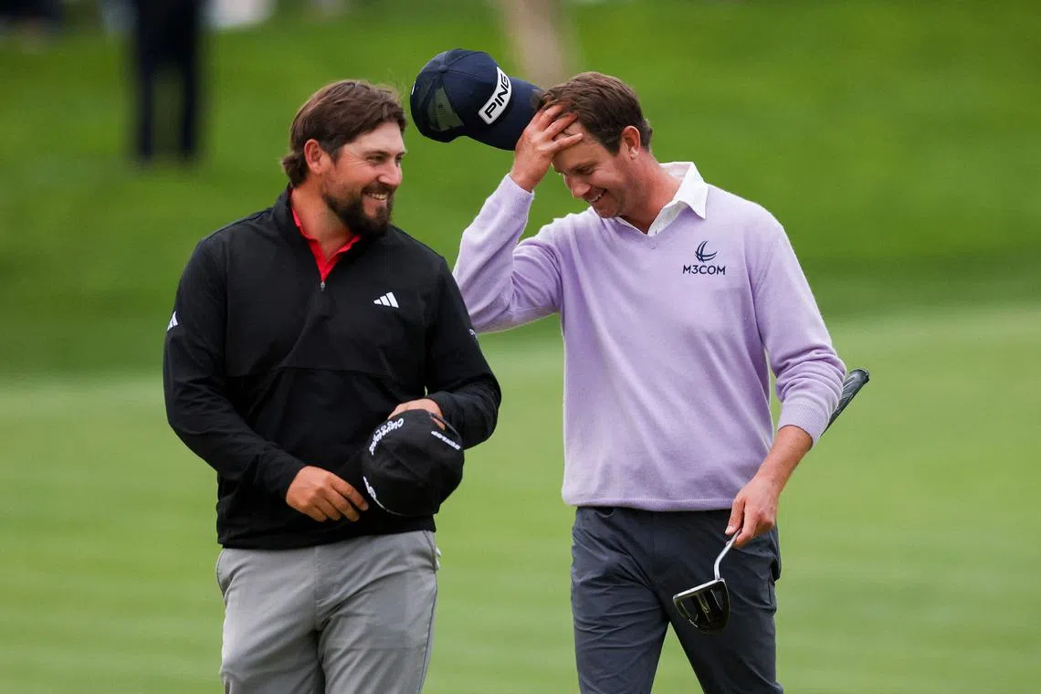 Harris English and Andrew Novak walk off the 18th hole during the final round of the Farmers Insurance Open 2025 at Torrey Pines Golf Course on Jan 25 in La Jolla, California.   