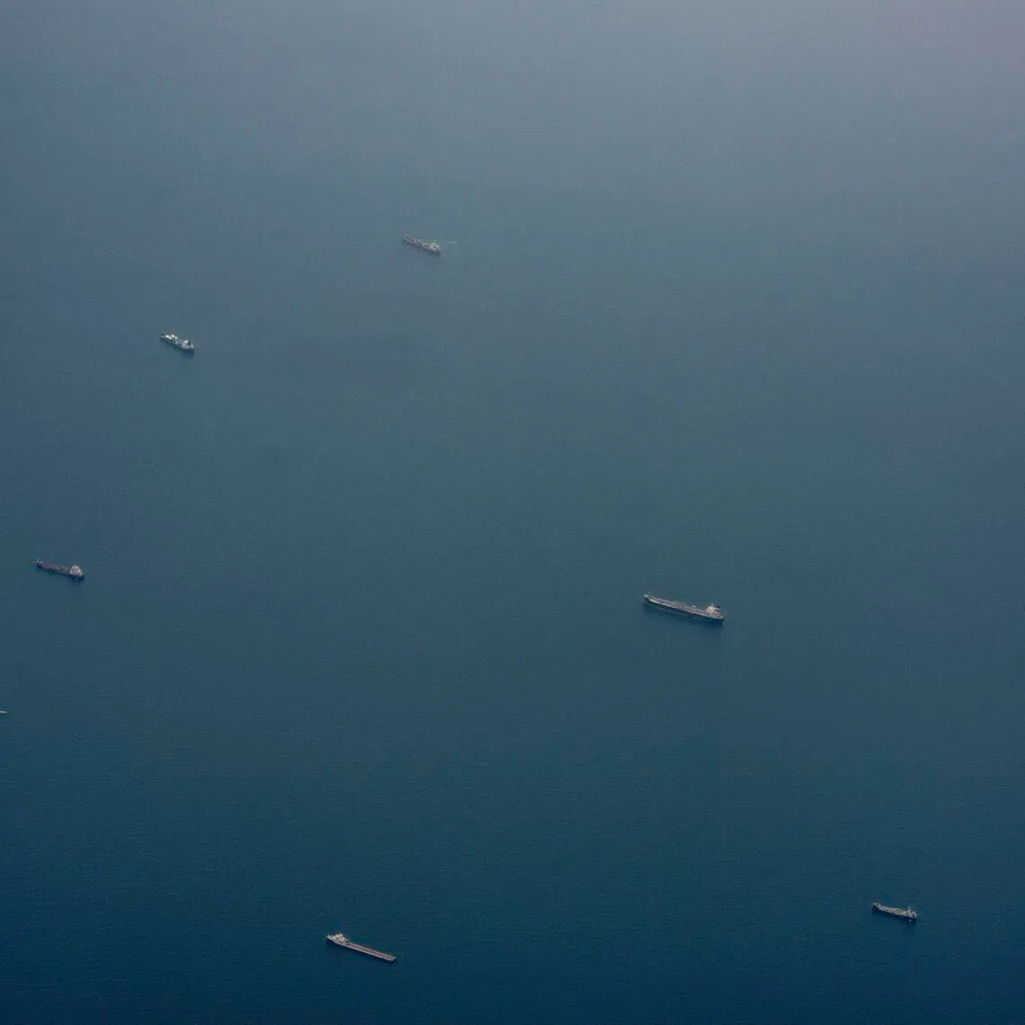 Ships near the Strait of Hormuz, as seen from a plane near the United Arab Emirates, on July 20.