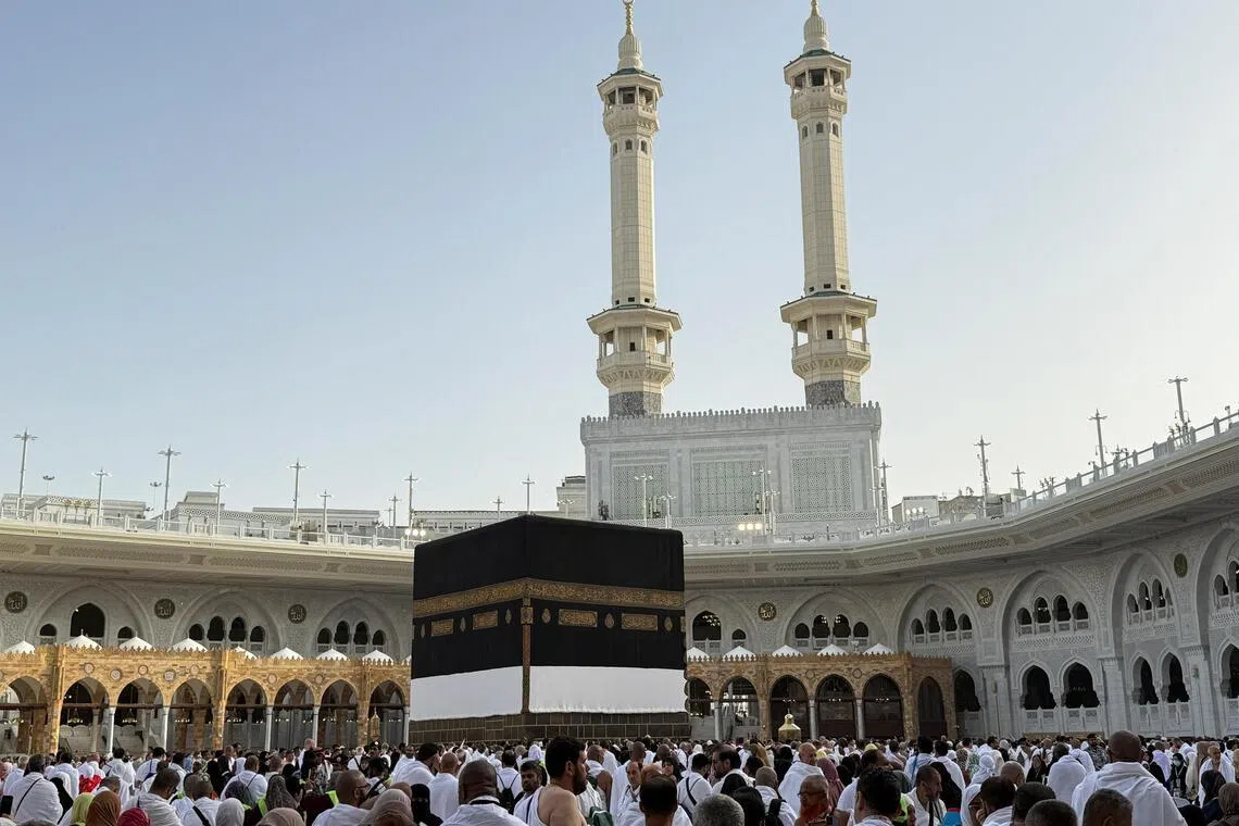 Muslim pilgrims circle the Kaaba and pray at the Grand Mosque, ahead of the annual haj pilgrimage, in Mecca, Saudi Arabia.