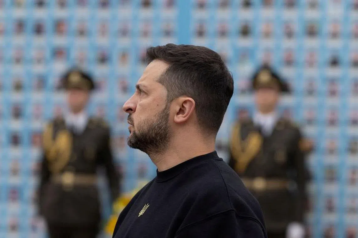 Ukraine's President Volodymyr Zelenskiy visits the Memory Wall of Fallen Defenders of Ukraine, amid Russia's attack on Ukraine, during Defenders of Ukraine Day commemoration in Kyiv, Ukraine October 1, 2023.  Ukrainian Presidential Press Service/Handout via REUTERS