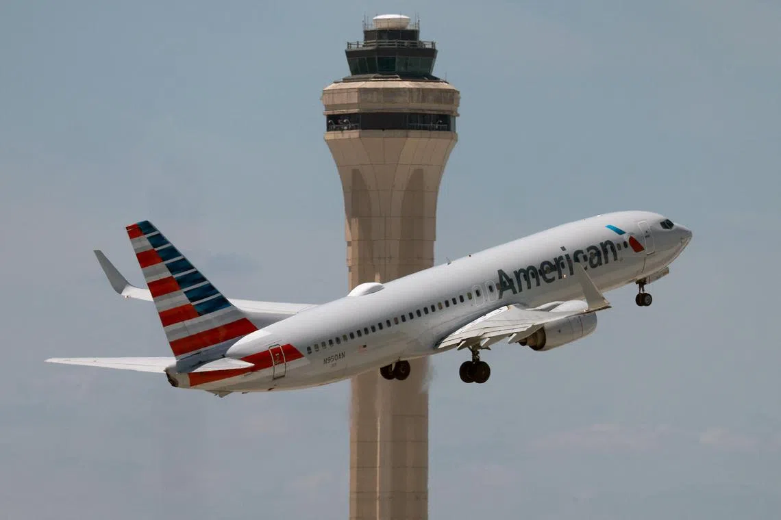 The woman on the American Airlines plane was "irate" after being asked to get off her phone as the plane was departing.
