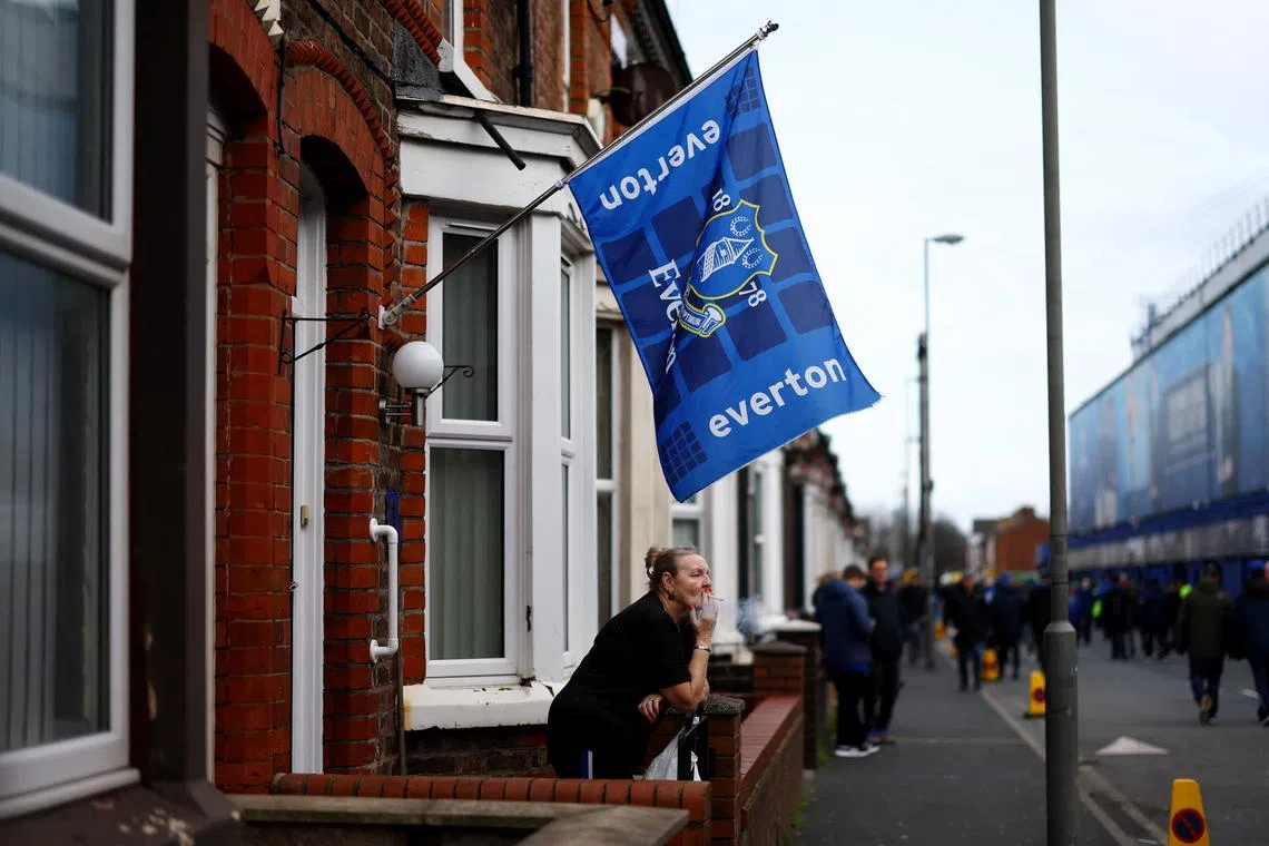 FILE PHOTO: Soccer Football -  FA Cup - Fourth Round - Everton v Luton Town - Goodison Park, Liverpool, Britain - January 27, 2024 General view of an Everton flag on a house outside the stadium before the match REUTERS/Carl Recine/File Photo