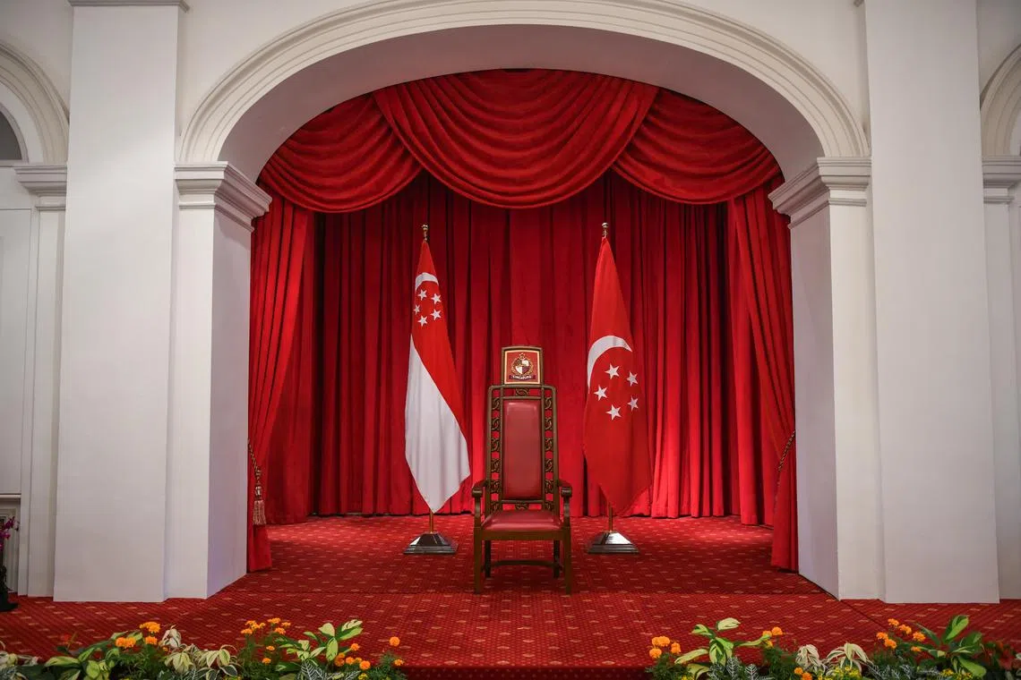 ST20230516_202390218139/pixgeneric/Shintaro Tay The President's chair, flanked by the State flag and the Presidential flag at the Istana. These pictures were shot while guests were awaiting the arrival of President Halimah at the Honorary Aide-de-Camp (HADC) appointment ceremony and appreciation dinner at the Istana on May 16, 2023.