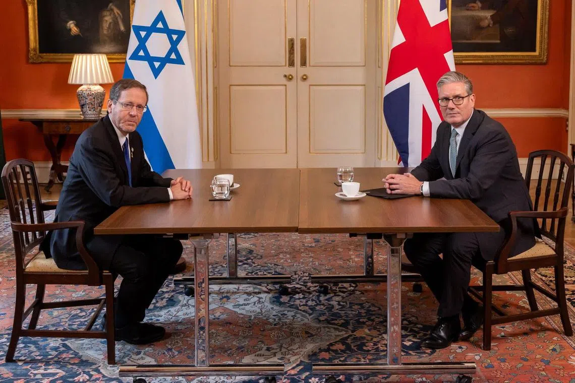 Israeli President Isaac Herzog (left) and British Prime Minister Keir Starmer meeting at 10 Downing Street in London on Sept 10.