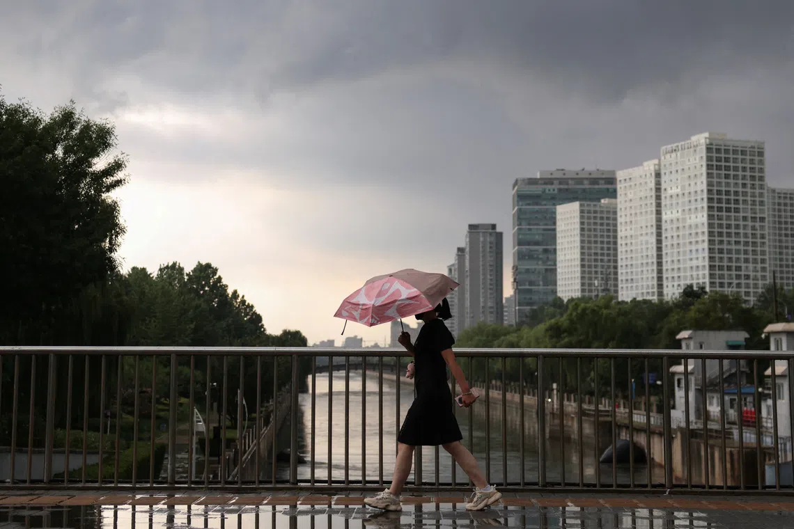Typhoon Dolphin's remnants brings torrential rain to Beijing
