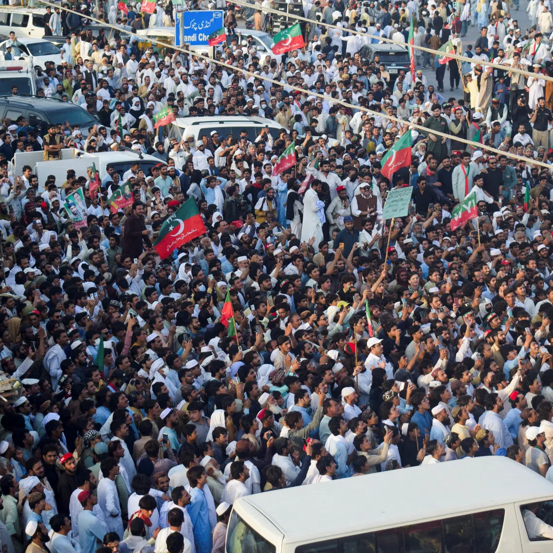 Supporters of former Pakistani Prime Minister Imran Khan's party, Pakistan Tehreek-e-Insaf (PTI), gather during a protest march demanding his release and calling for the supremacy of the Constitution and the rule of law across the country, in Lakki Marwat, Khyber Pakhtunkhwa province, Pakistan, October 4, 2026. REUTERS/Stringer