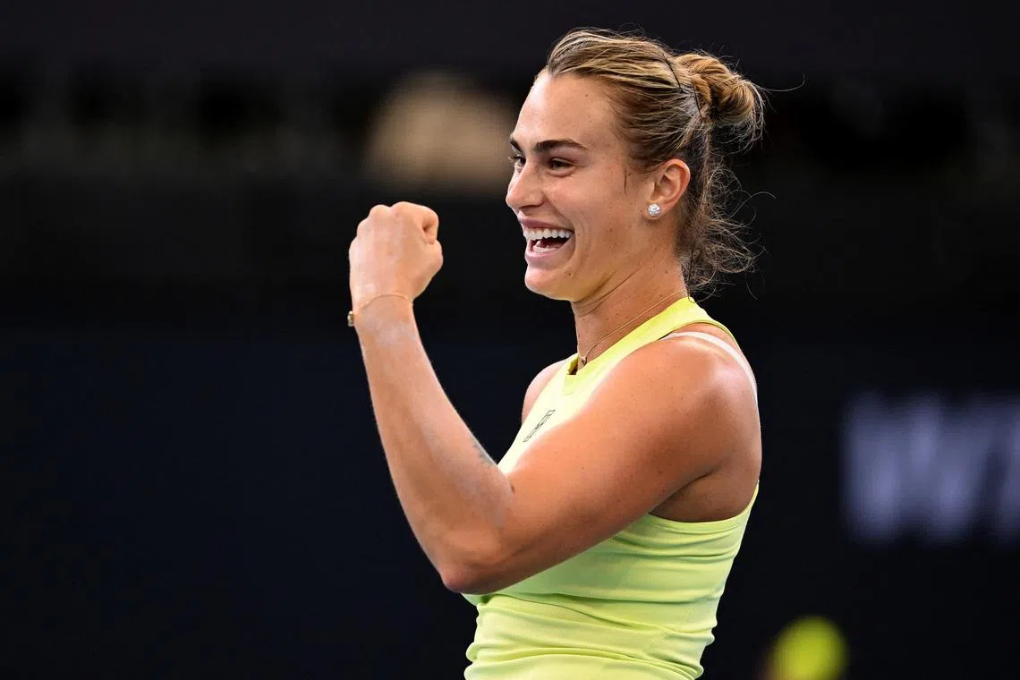 Tennis - Brisbane International Tennis Tournament - Queensland Tennis Centre, Brisbane, Australia - January 4, 2026 Belarus' Aryna Sabalenka reacts during her women's doubles round of 16 match with Spain's Paula Badosa against China's Zhang Shuai and Russia's Liudmila Samsonova ZAIN MOHAMMED/AAP Image via REUTERS