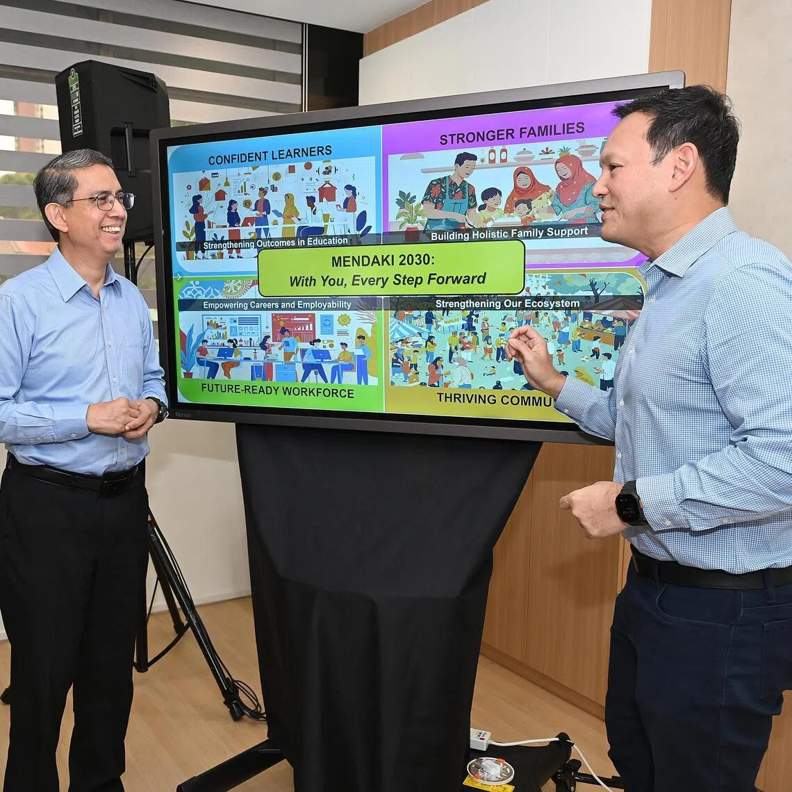 (From left) Mendaki chief executive Feroz Akber, Acting Minister-in-charge of Muslim Affairs Faishal Ibrahim and Senior Minister of State for Defence Zaqy Mohamad, showing the group’s five-year work plan to strengthen educational support, expand outreach and deepen partnerships, on Jan 15.