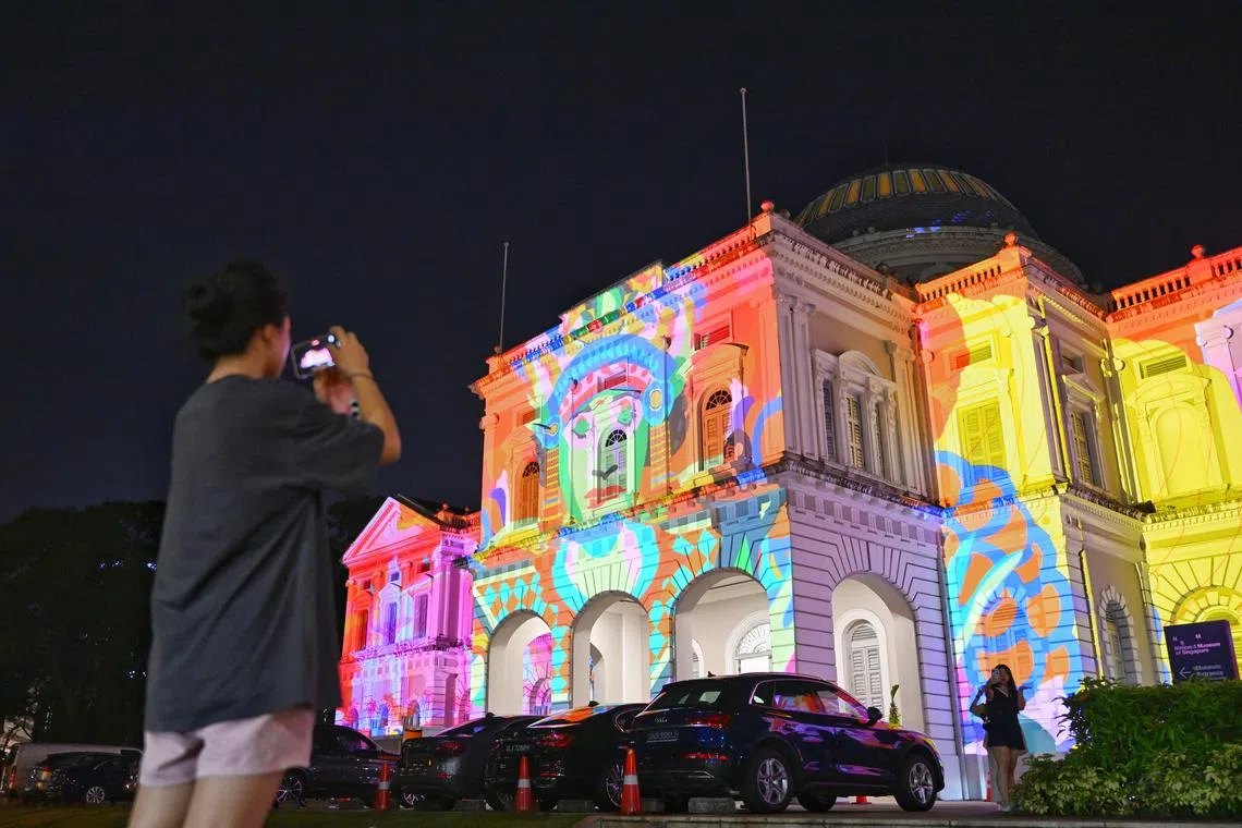 This year's Singapore Night Festival speeds through 700 years of Singapore history in six minutes on the facade of the National Museum Singapore. 