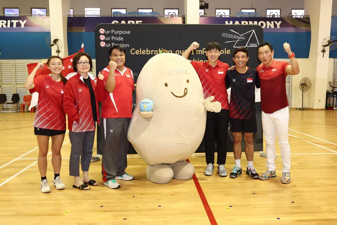 (From left) Tchoukball women’s player Jelynn Lee; Olivia Wong, Panyasingha Sports director; Delane Lim, Tchoukball Association of Singapore president; men’s captain Ivan Ng; men's player Muhd Raziq and senior parliamentary secretary for the Ministry of Culture, Community and Youth Eric Chua with the Mr Bean national mascot for Tchoukball Singapore 2023.
