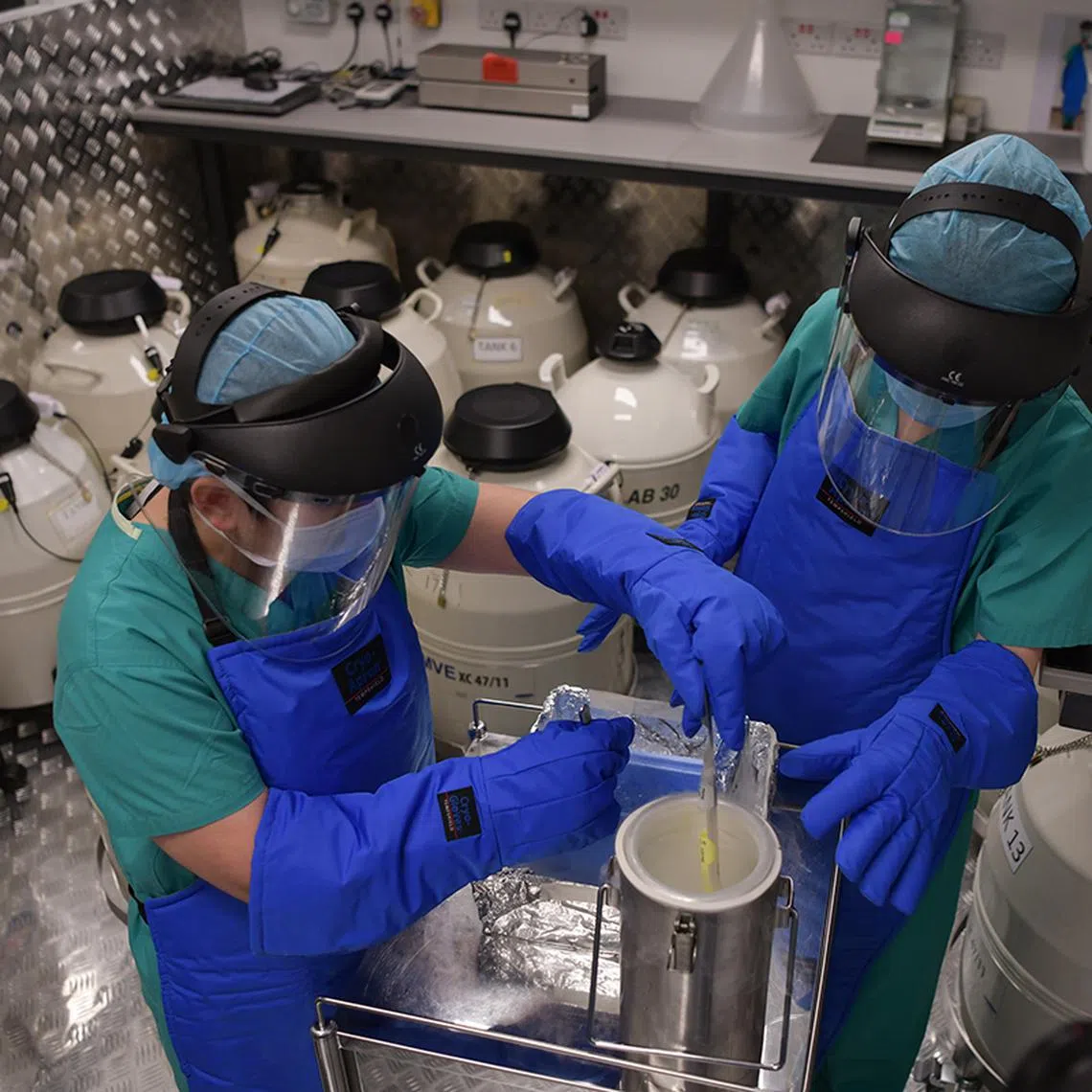 ST20230620_202394977514/Shintaro Tay/Jean Iau/ STEP 4 The eggs are placed in tanks where they can be frozen forever, said Ms Mathew, noting that each tank holds the eggs of up to 150 patients. Ahead of the implementation of elective egg freezing in Singapore, at NUH, where eggs are frozen and stored, was on showcase to The Straits Times on June 20, 2023.