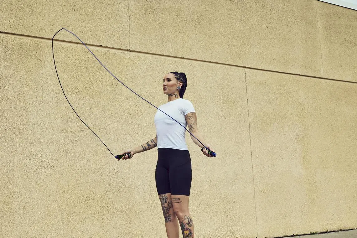 A woman jumps rope in Vallejo, Calif. on Dec 28, 2021. For most of us, shelling out thousands of dollars on fitness equipment is not practical. 