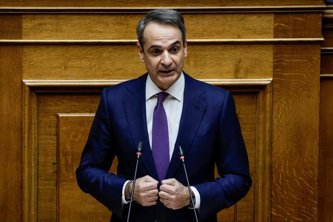 FILE PHOTO: Greek Prime Minister Kyriakos Mitsotakis addresses lawmakers ahead of a parliament vote on the 2024 budget, in the Greek parliament in Athens, Greece December 17, 2023. REUTERS/Louisa Gouliamaki/File Photo