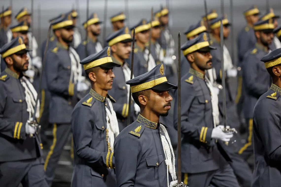 FILE PHOTO: Members of Saudi security forces participate in a parade in preparation for the annual haj pilgrimage, in the holy city of Mecca, Saudi Arabia, June 10, 2024. REUTERS/Mohammed Torokman/File Photo