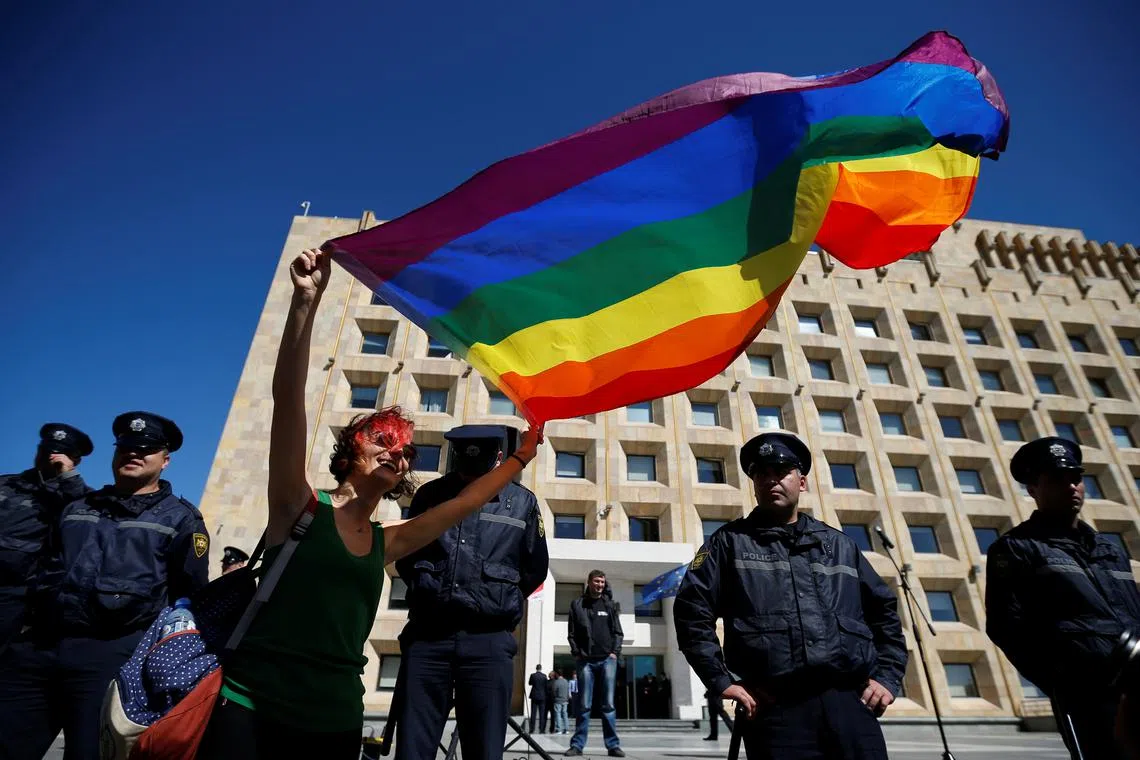 FILE PHOTO: LGBT activist attends a rally against Homophobia and Transphobia in Tbilisi, Georgia, May 17, 2017. REUTERS/David Mdzinarishvili/File Photo