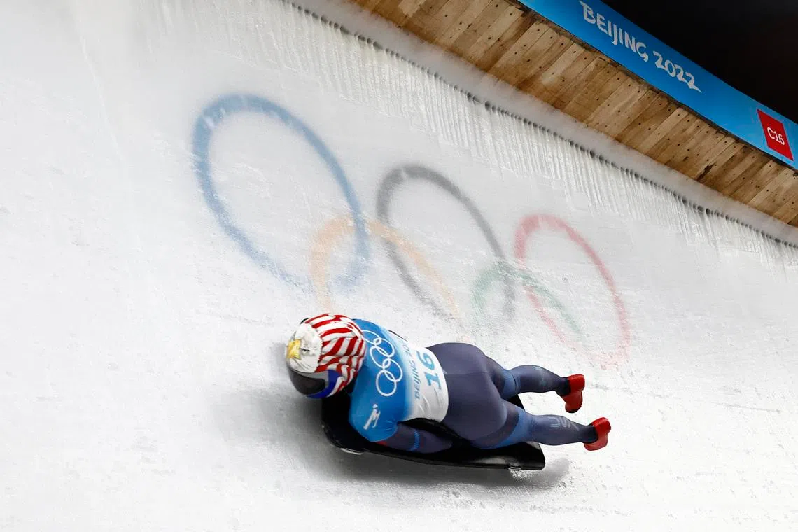 2022 Beijing Olympics - Skeleton - Women Heat 3 - National Sliding Centre, Beijing, China - February 12, 2022. Katie Uhlaender of the United States in action. REUTERS/Thomas Peter