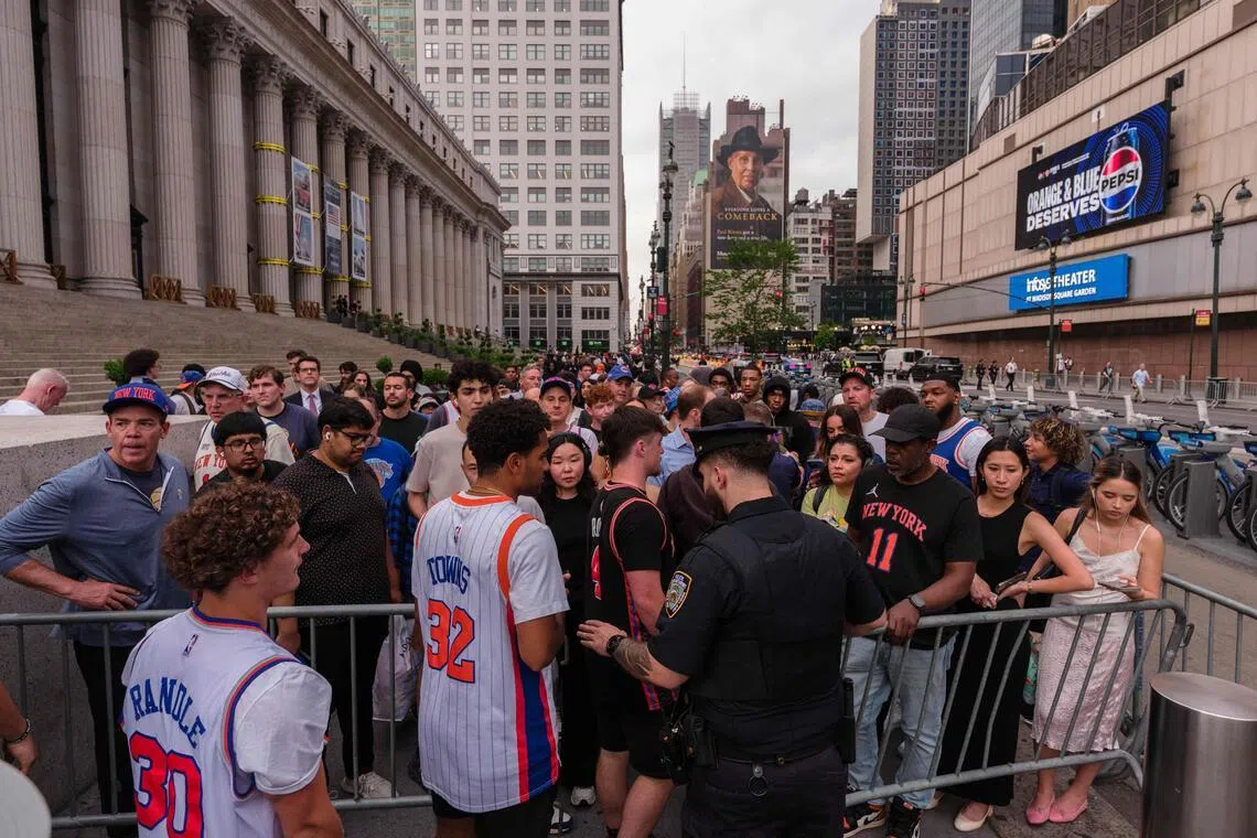 NYPD officers direct people outside of Madison Square Garden before Game 4 of the NBA Finals between New York Knicks and San Antonio Spurs, on June 10, 2026.