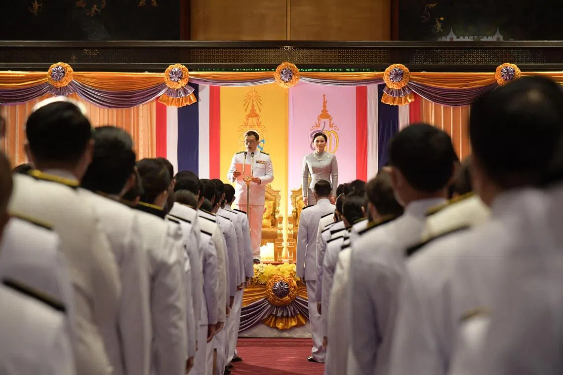 TOPSHOT - This handout taken and released by Thai Parliament on July 3, 2023 shows Thai King Maha Vajiralongkorn (centre L), alongside Queen Suthida (centre R), as he addresses rows of MPs during the official ceremony to open parliament at Thailand’s Parliament in Bangkok. (Photo by Thai Parliament / AFP) / RESTRICTED TO EDITORIAL USE - MANDATORY CREDIT "AFP PHOTO /Thai Parliament   " - NO MARKETING NO ADVERTISING CAMPAIGNS - DISTRIBUTED AS A SERVICE TO CLIENTS