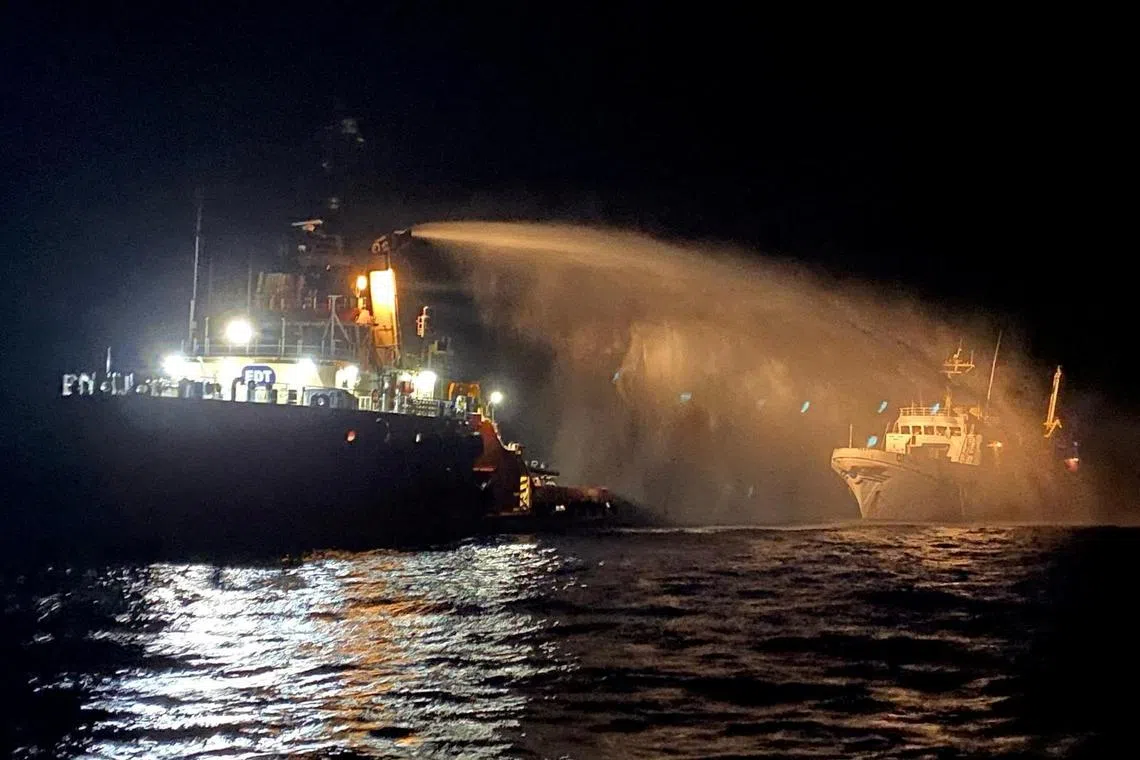 A tug vessel puts out a fire on the Gaza Freedom Flotilla vessel Conscience outside Maltese territorial waters in this handout picture provided by Malta Goverment Department of Information, May 2, 2025.  Goverment of Malta/Handout via REUTERS