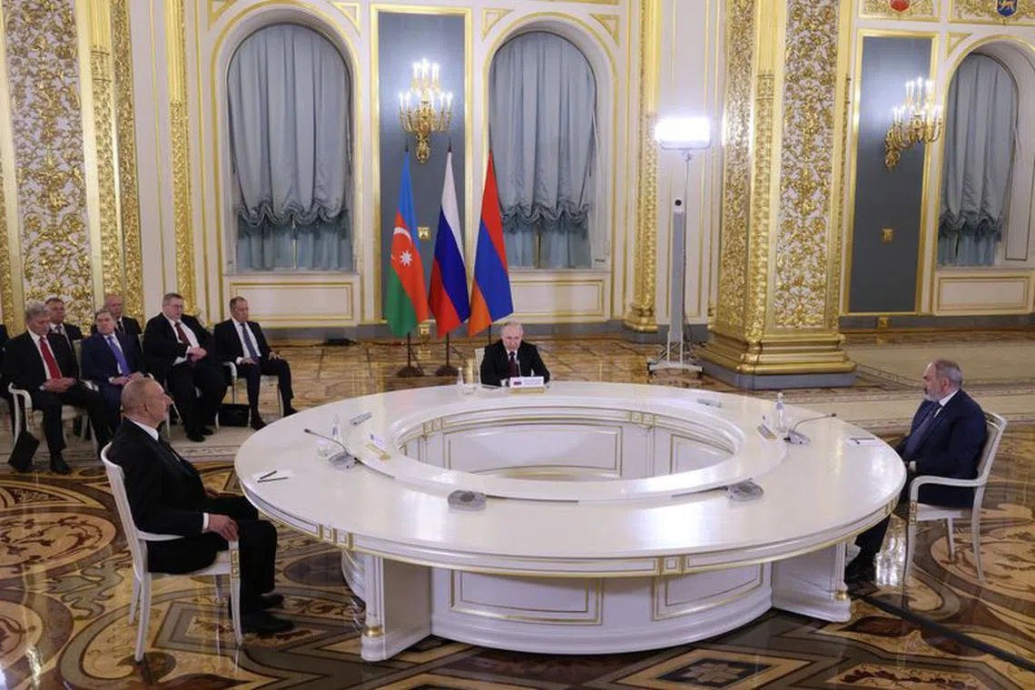 Russia's President Vladimir Putin meets with Armenia's Prime Minister Nikol Pashinyan and Azerbaijan's President Ilham Aliyev on the sidelines of the Eurasian Economic Union summit in Moscow, Russia May 25, 2023. Sputnik/Mikhail Metzel/Pool via REUTERS/File Photo