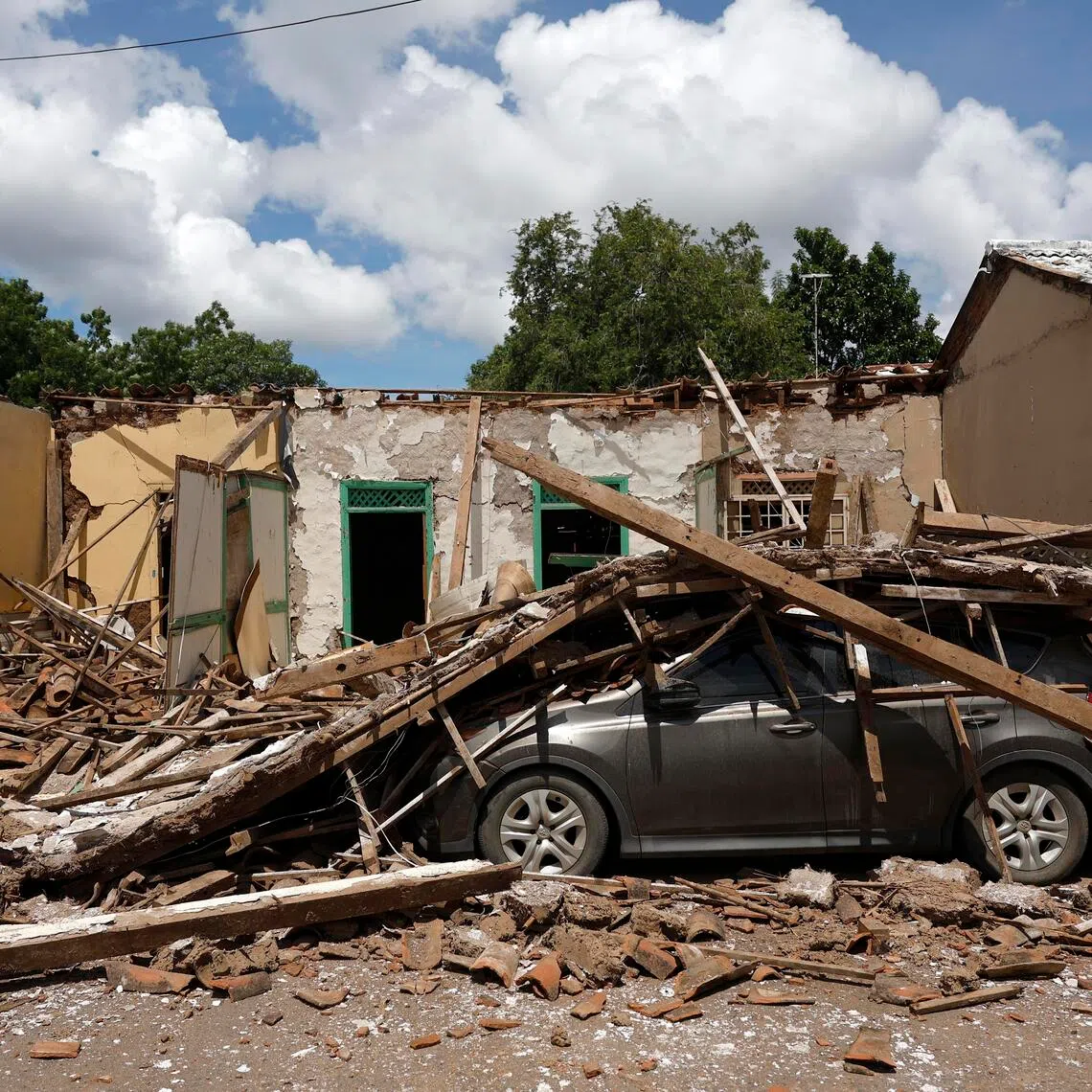 After the initial 7.7-magnitude quake around midday on Oct 9, more than 100 aftershocks have been recorded, some as strong as magnitude 6.0.