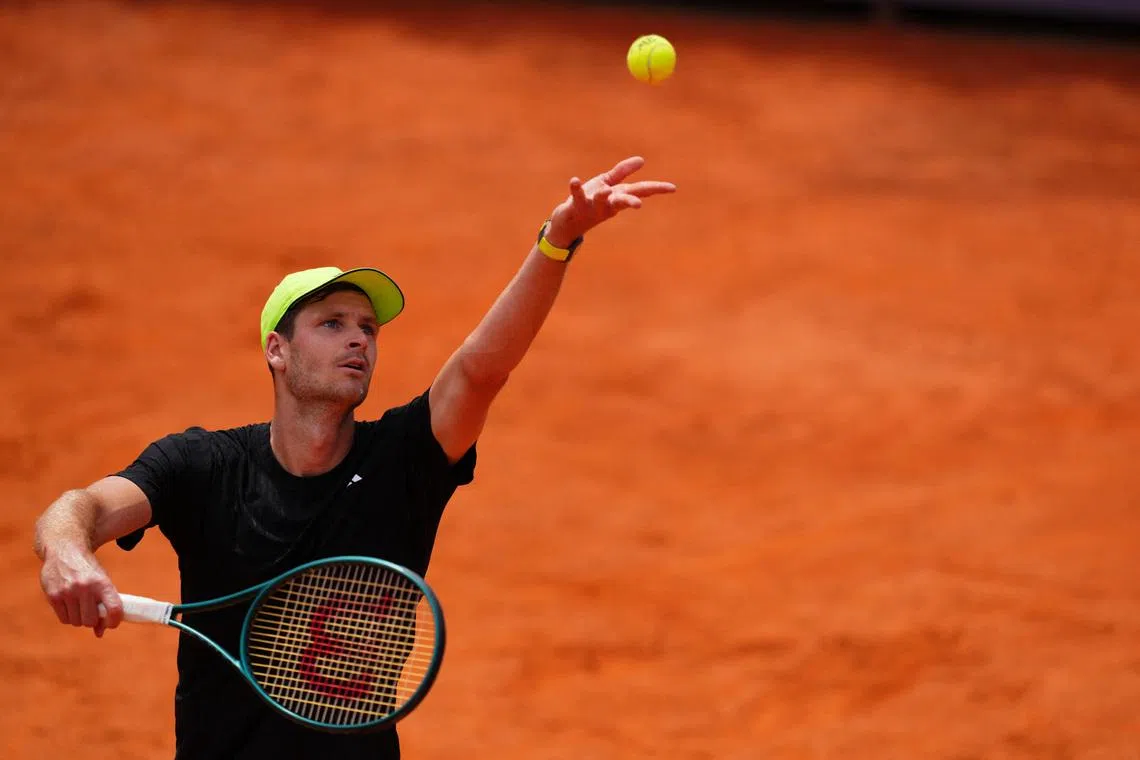 FILE PHOTO: Tennis - Italian Open - Foro Italico, Rome, Italy - May 15, 2025 Poland's Hubert Hurkacz in action during his quarter final match against Tommy Paul of the U.S. REUTERS/Aleksandra Szmigiel/File Photo