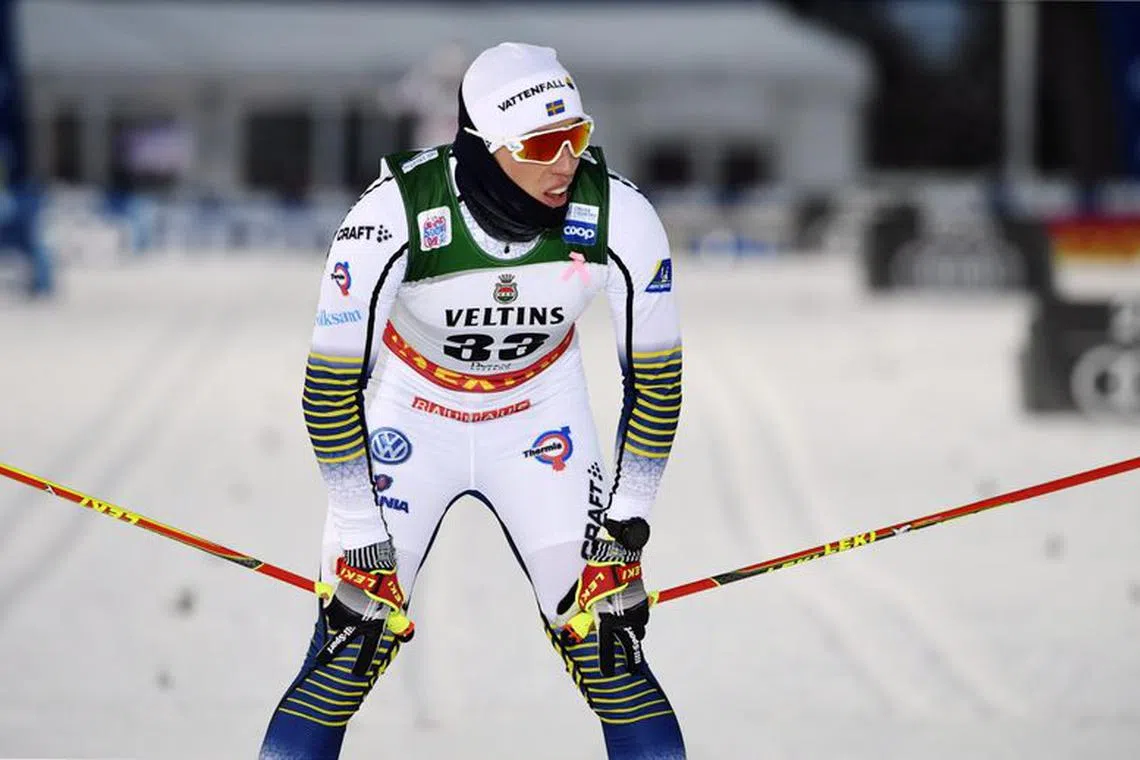 FILE PHOTO: FIS Nordic Skiing World Cup - Cross-Country - Men's 15km Classic Competition - Ruka, Finland - November 25, 2018. Calle Halfvarsson of Sweden crosses the finish line. Lehtikuva/Markku Ulander via REUTERS/File Photo
