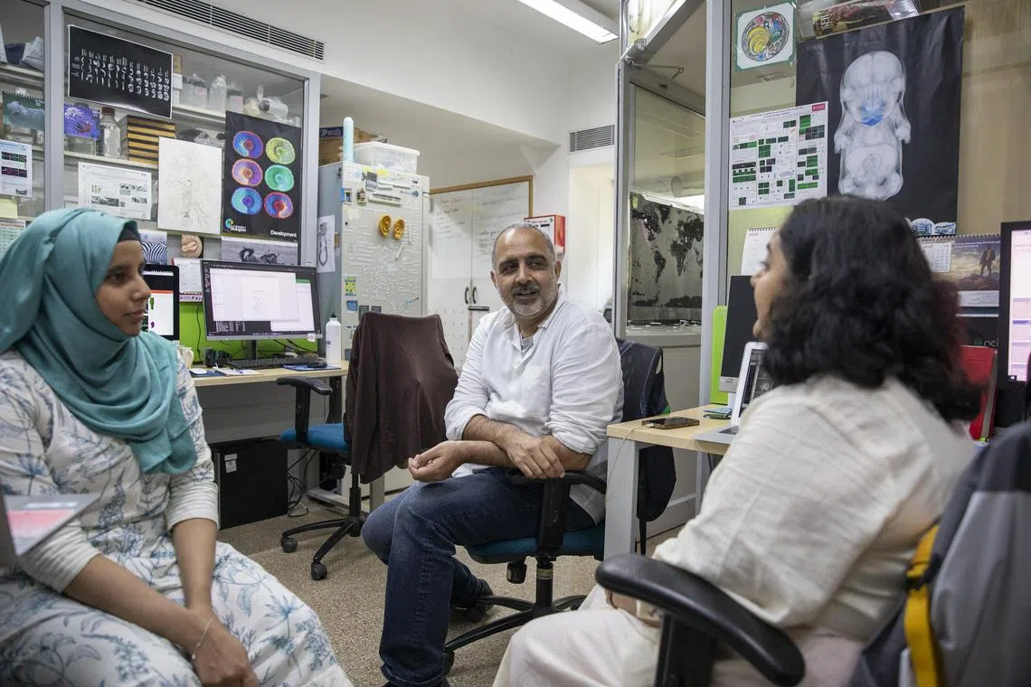 Professor Raj Ladher, of the National Centre for Biological Sciences in Bangalore, India, with PhD students on May 26.