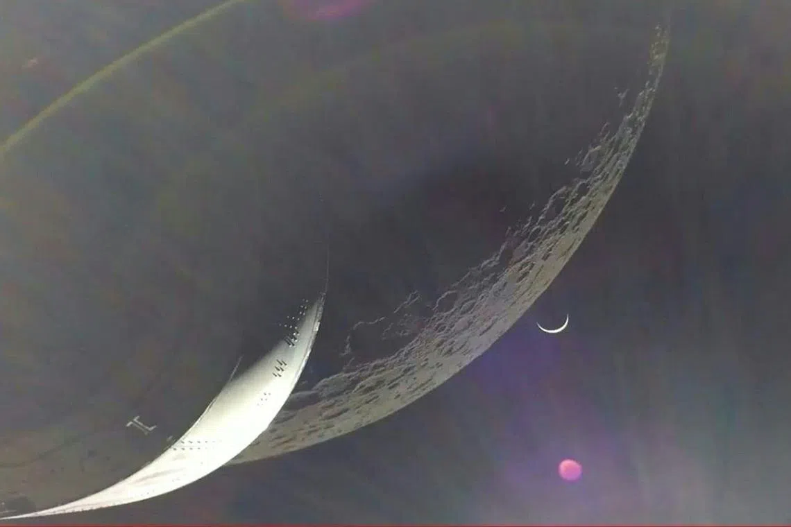The Earth is visible as a crescent in the minutes after Orion finished its engine burn around the moon on Dec 5, 2022.