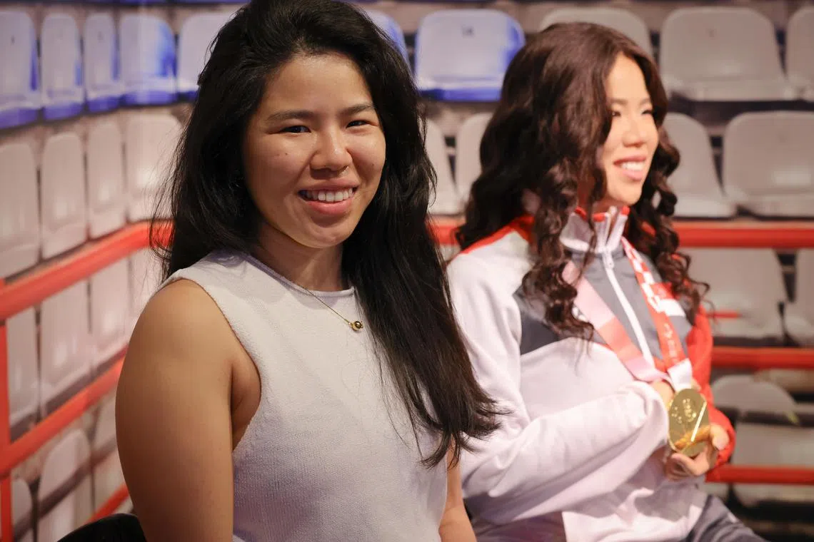 rbtussaud11 ST20240306_202437345531 Ong Wee Jin / Rohi Brijnath / 

Yip Pin Xiu (left together with her wax figure at Madame Tussauds Singapore, March 6, 2024.