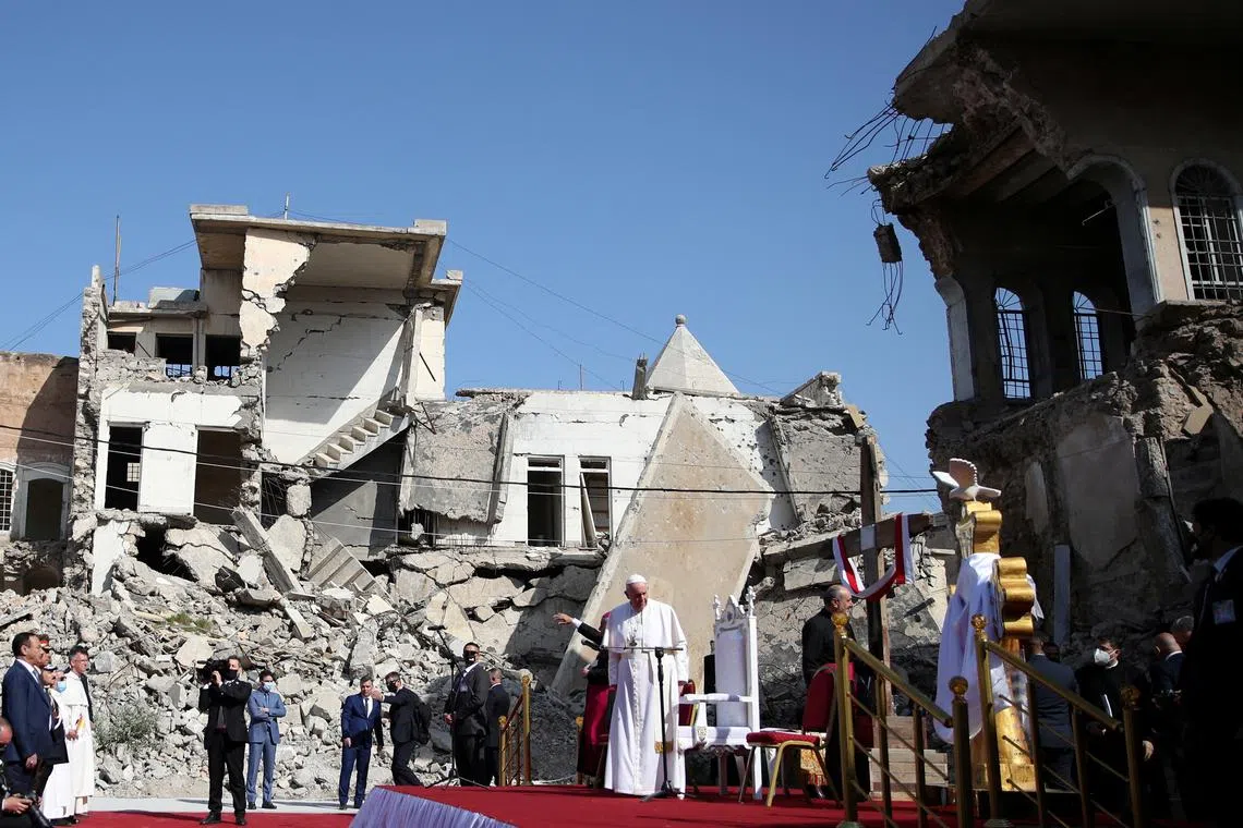 FILE PHOTO: Pope Francis arrives to pray for war victims at 'Hosh al-Bieaa', Church Square, in Mosul's old city, Iraq, March 7, 2021. REUTERS/Yara Nardi