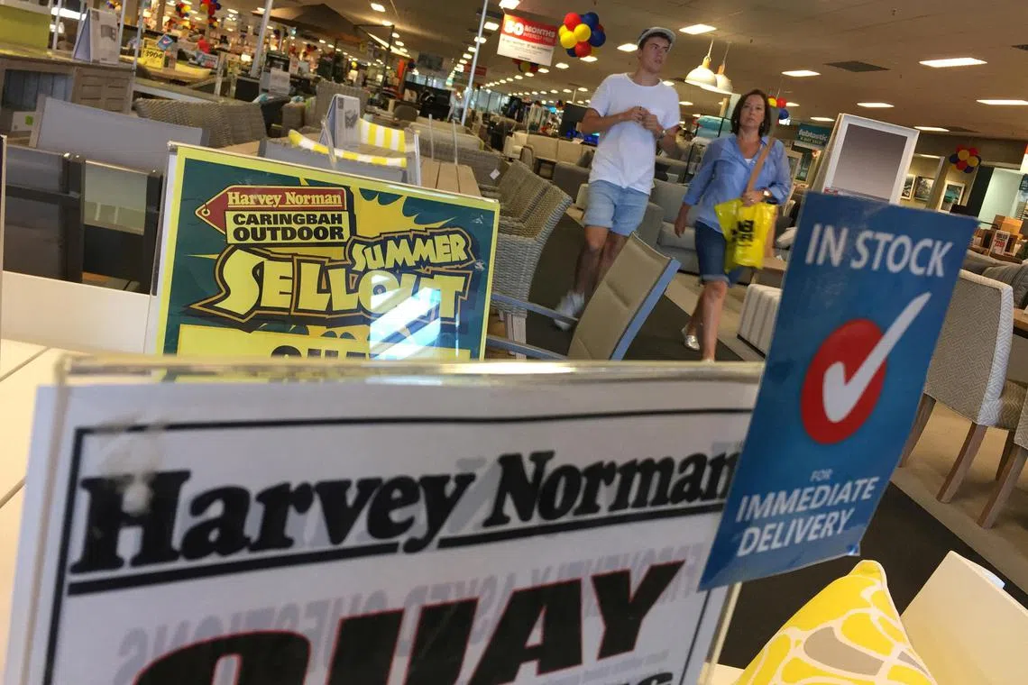 FILE PHOTO: Shoppers walk the furniture showroom at a Harvey Norman outlet in Sydney, Australia, February 27, 2017.  REUTERS/Jason Reed/File Photo