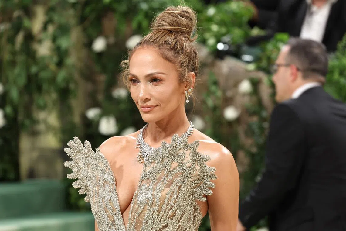 NEW YORK, NEW YORK - MAY 06: Jennifer Lopez attends The 2024 Met Gala Celebrating "Sleeping Beauties: Reawakening Fashion" at The Metropolitan Museum of Art on May 06, 2024 in New York City.   Marleen Moise/Getty Images/AFP (Photo by Marleen Moise / GETTY IMAGES NORTH AMERICA / Getty Images via AFP)