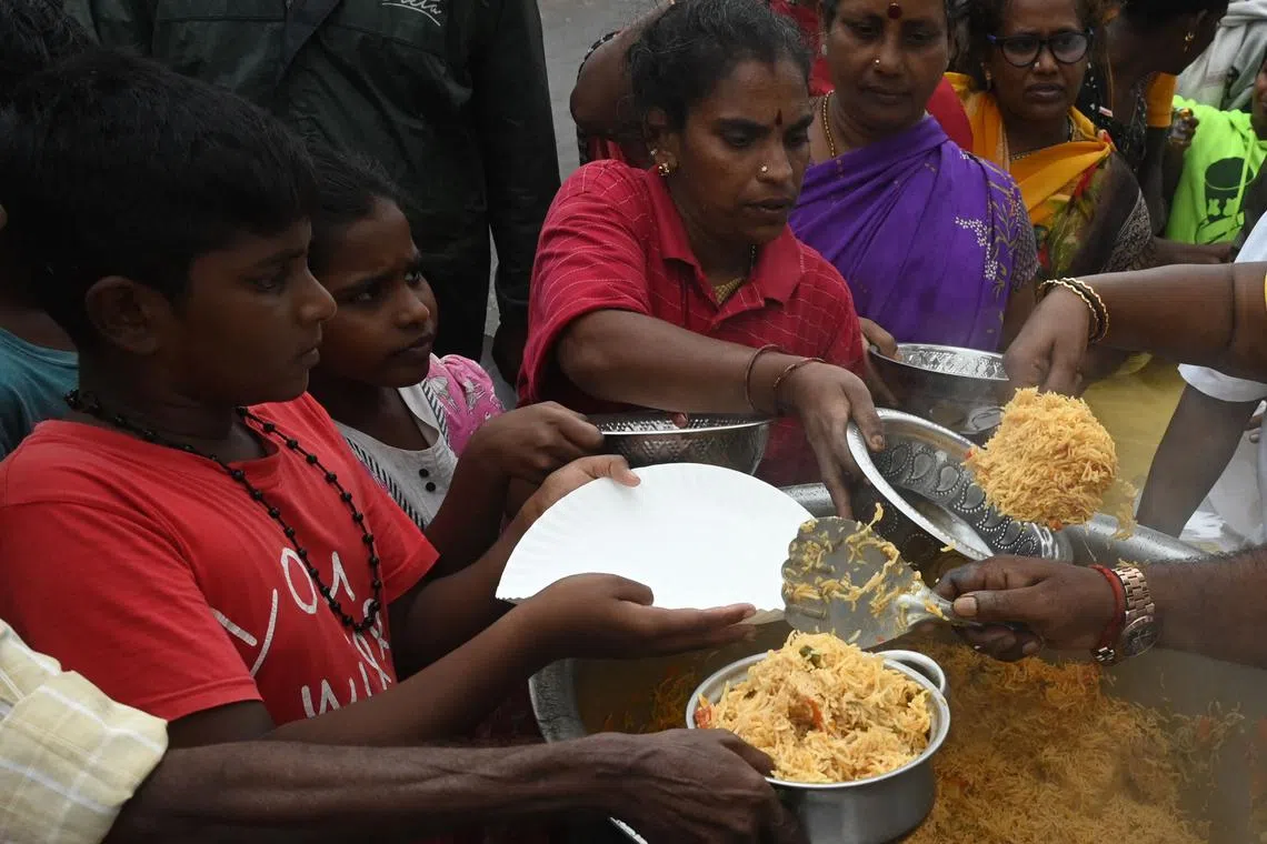 More than 800 million people received an extra 5kg of free rice or wheat in the last 28 months.