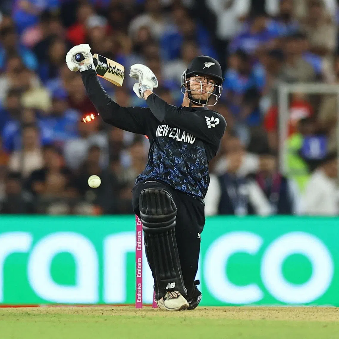 Cricket - ICC Men's T20 World Cup 2026 - Final - India v New Zealand - Narendra Modi Stadium, Ahmedabad, India - March 8, 2026 New Zealand's Mitchell Santner is bowled out by India's Jasprit Bumrah. REUTERS/Anushree Fadnavis
