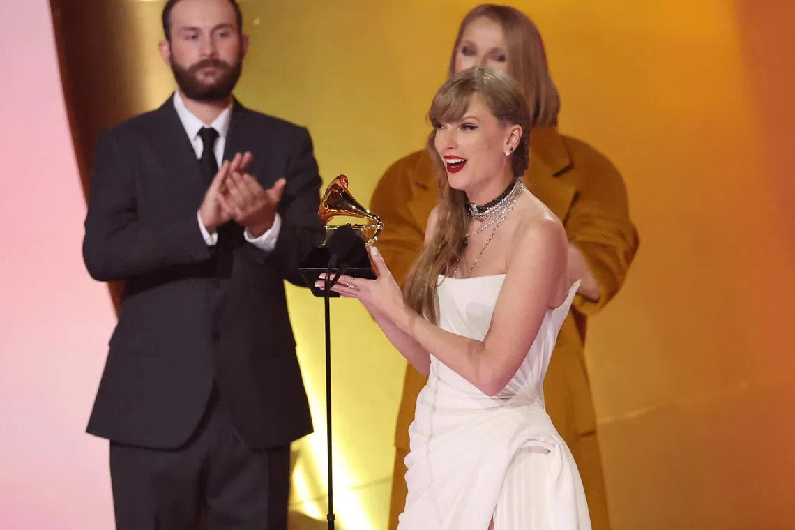 Taylor Swift accepts the Album Of The Year award for Midnights at the 66th GRAMMY Awards on Feb 4, 2024.