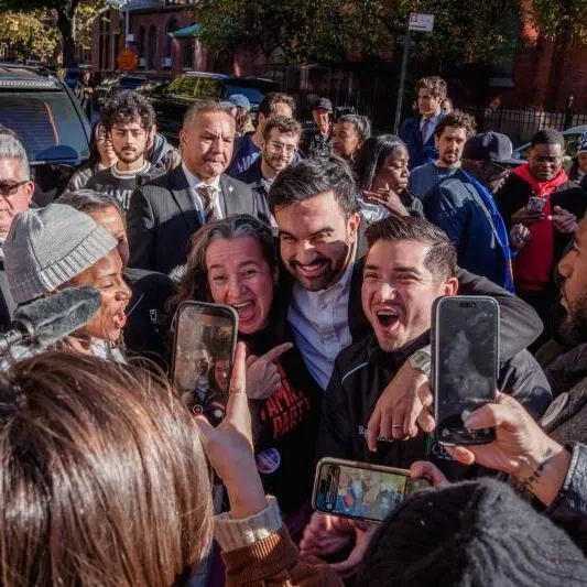 Zohran Mamdani, New York City mayoral candidate, joined by Jumaane Williams, New York City's public advocate, campaigns in the Brooklyn borough of New York, US, on Tuesday, Nov. 4, 2025. New Yorkers heading to the ballot box to select a new mayor face stark choices: a youthful socialist, a seasoned ex-governor or a red-beret-wearing radio host. Photographer: Adam Gray/Bloomberg