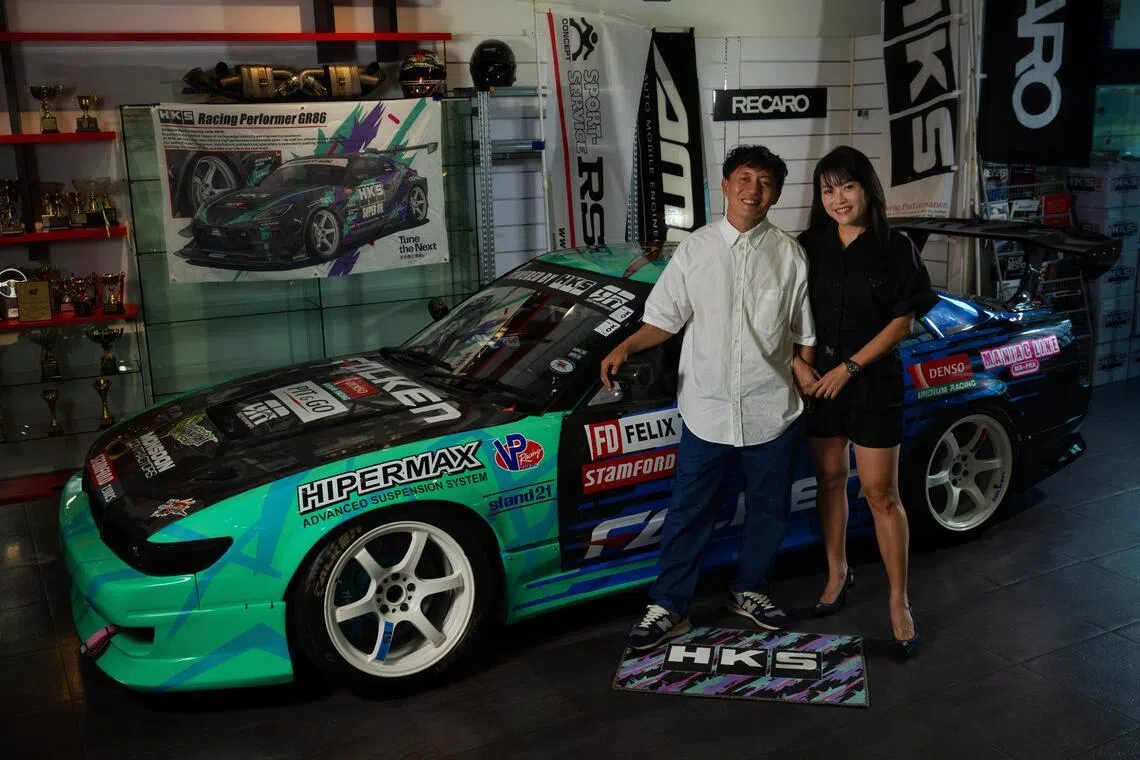 Mr Felix Lim and Ms Charmain Hng with their Nissan Sileighty, which is used in local competitions.