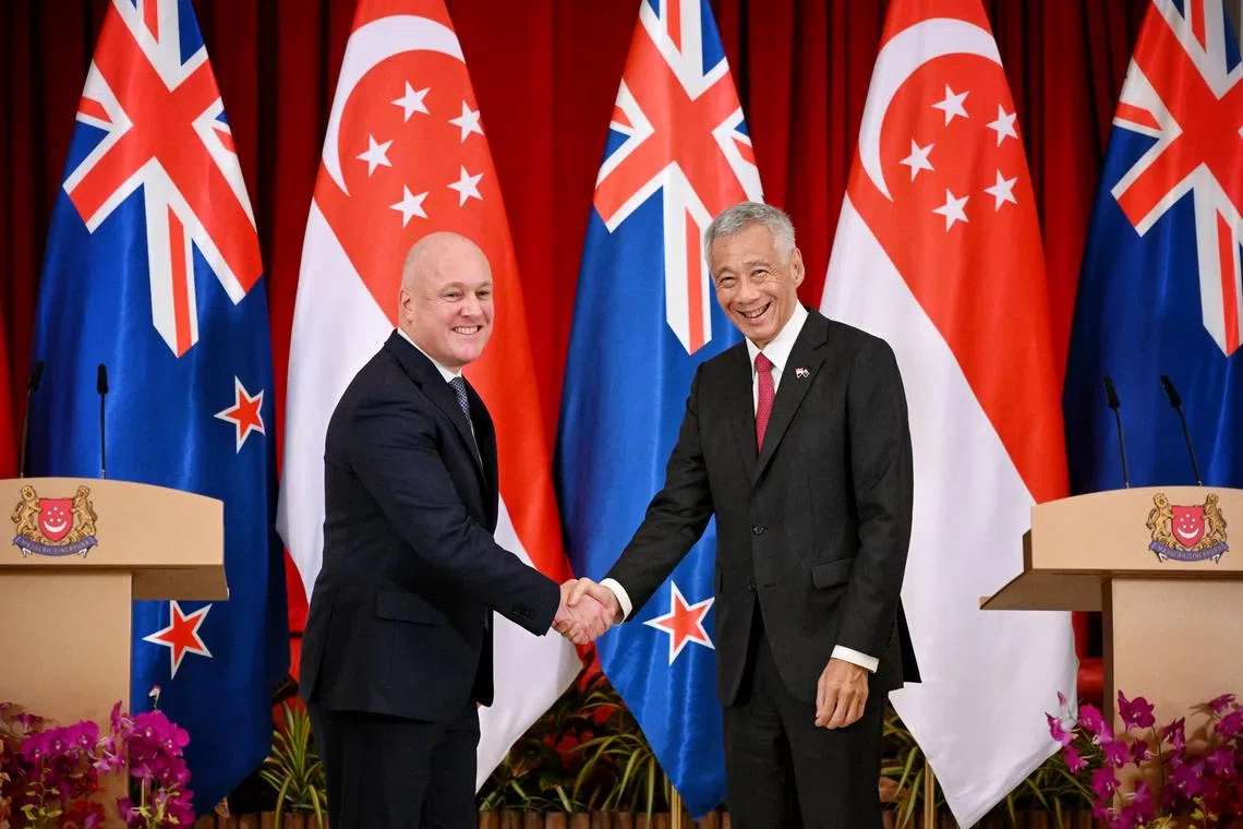 PM Lee Hsien Loong (right) with his New Zealand counterpart Christopher Luxon at the Istana on April 15.