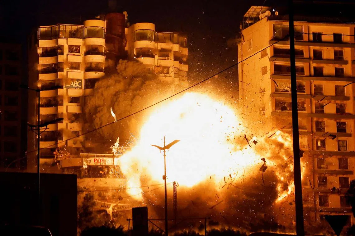 An Israeli strike on a building, amid the ongoing hostilities between Hezollah and Israeli forces, in the Chiyah district of Beirut's southern suburbs, Lebanon, Nov 25, 2024. 