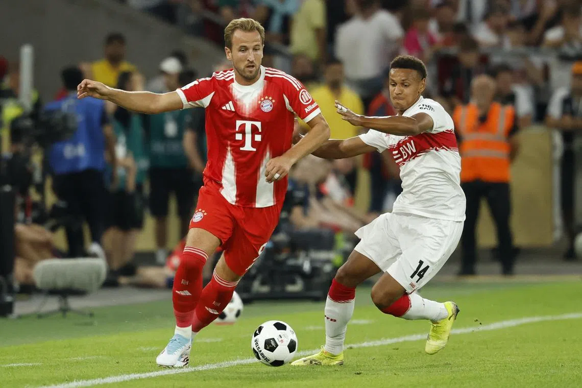 Soccer Football - Franz Beckenbauer Supercup 2025 - VFB Stuttgart v Bayern Munich - MHPArena, Stuttgart, Germany - August 16, 2025 Bayern Munich's Harry Kane in action with VfB Stuttgart's Luca Jaquez REUTERS/Heiko Becker