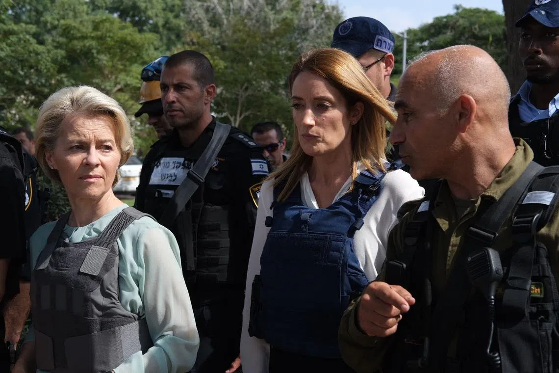 Ms von der Leyen (left) and European Parliament speaker Roberta Metsola toured the scene of many of the killings at the Kfar Aza kibbutz in Israel.