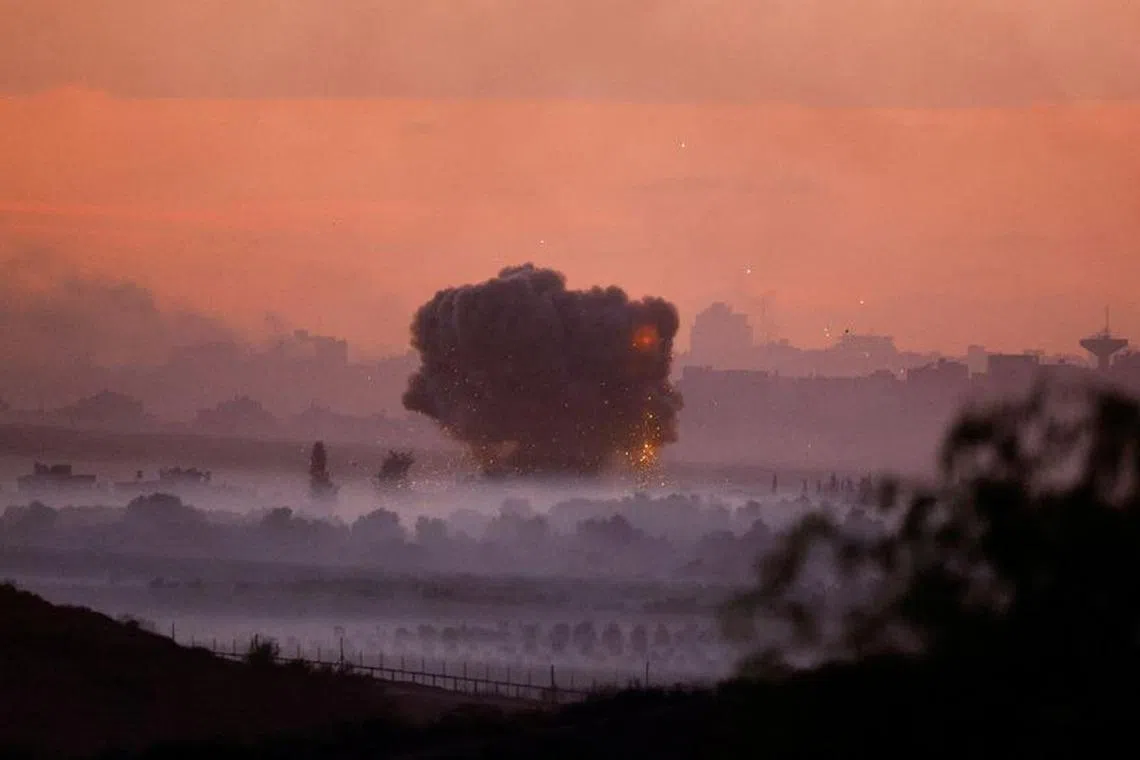 Smoke rises after Israeli air strikes in Gaza, as seen from southern Israel, amid the ongoing conflict between Israel and the Palestinian group Hamas, November 21, 2023. REUTERS/Alexander Ermochenko